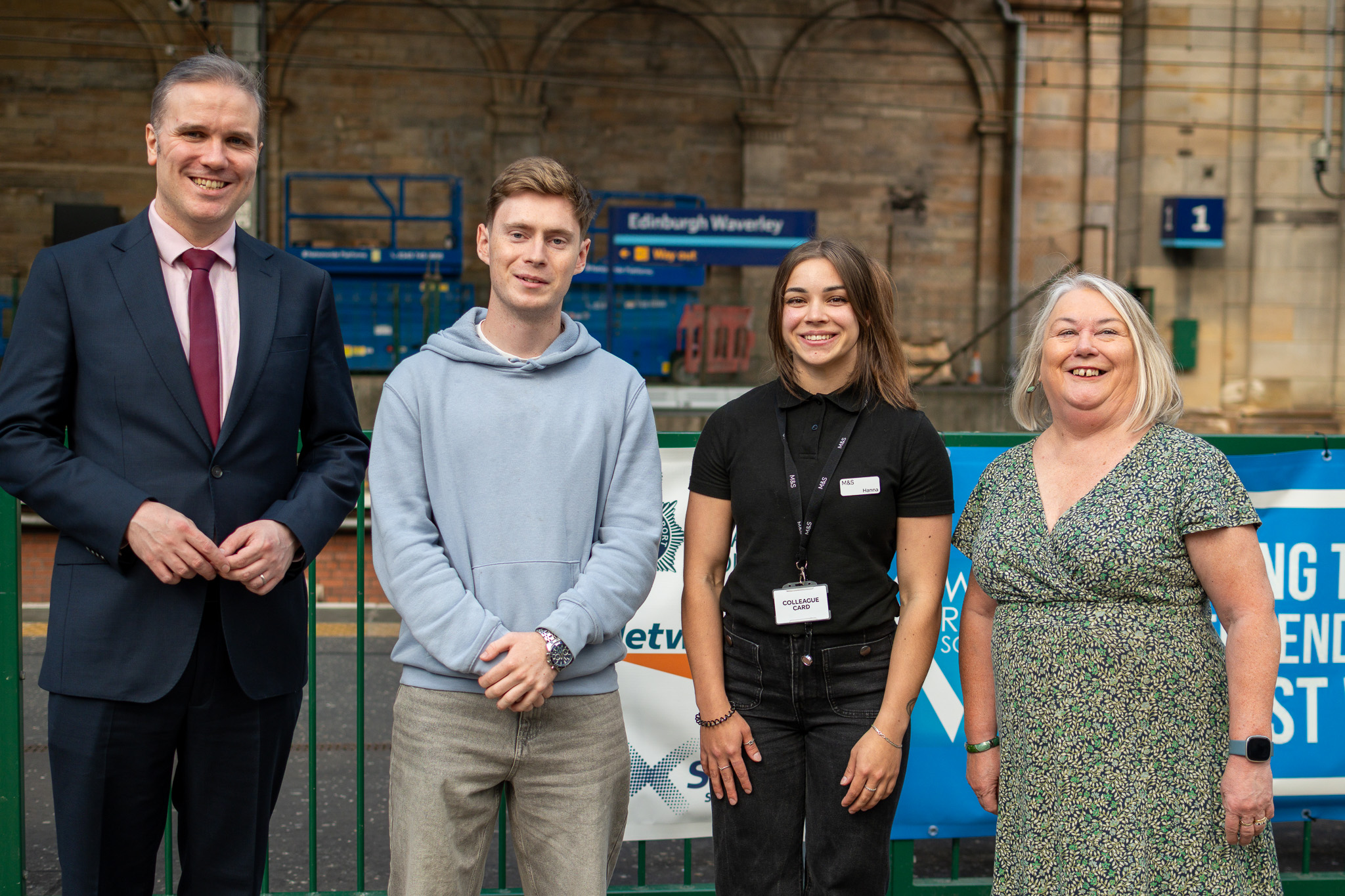 Tom Arthur MSP and Councillor Maureen Chalmers meeting with Luke and Hannah supported through No One Left Behind.